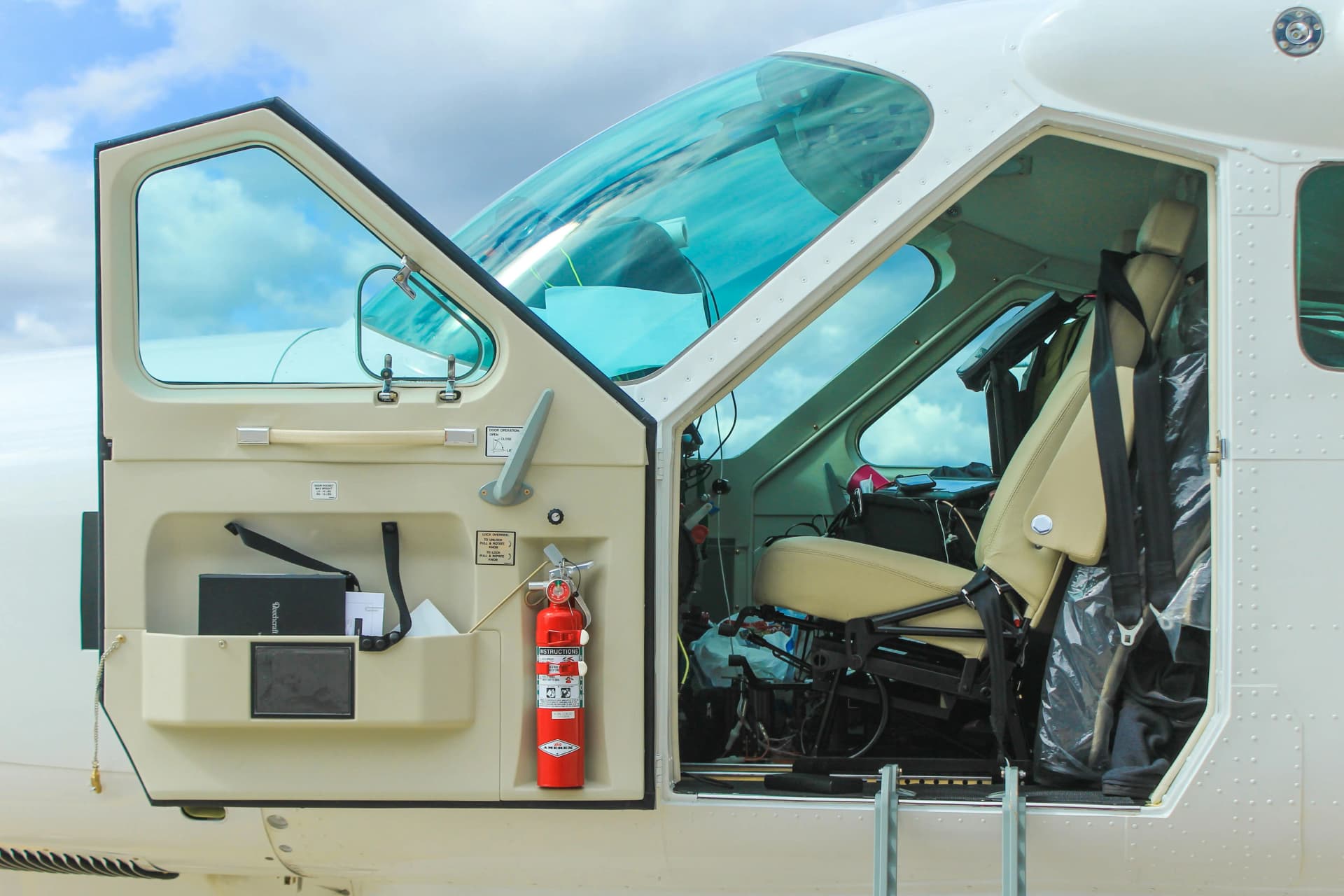 Aircraft door panel upholstery